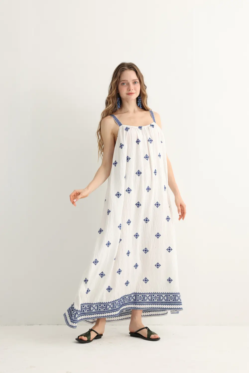 Greek-inspired blue embroidered maxi dress side view